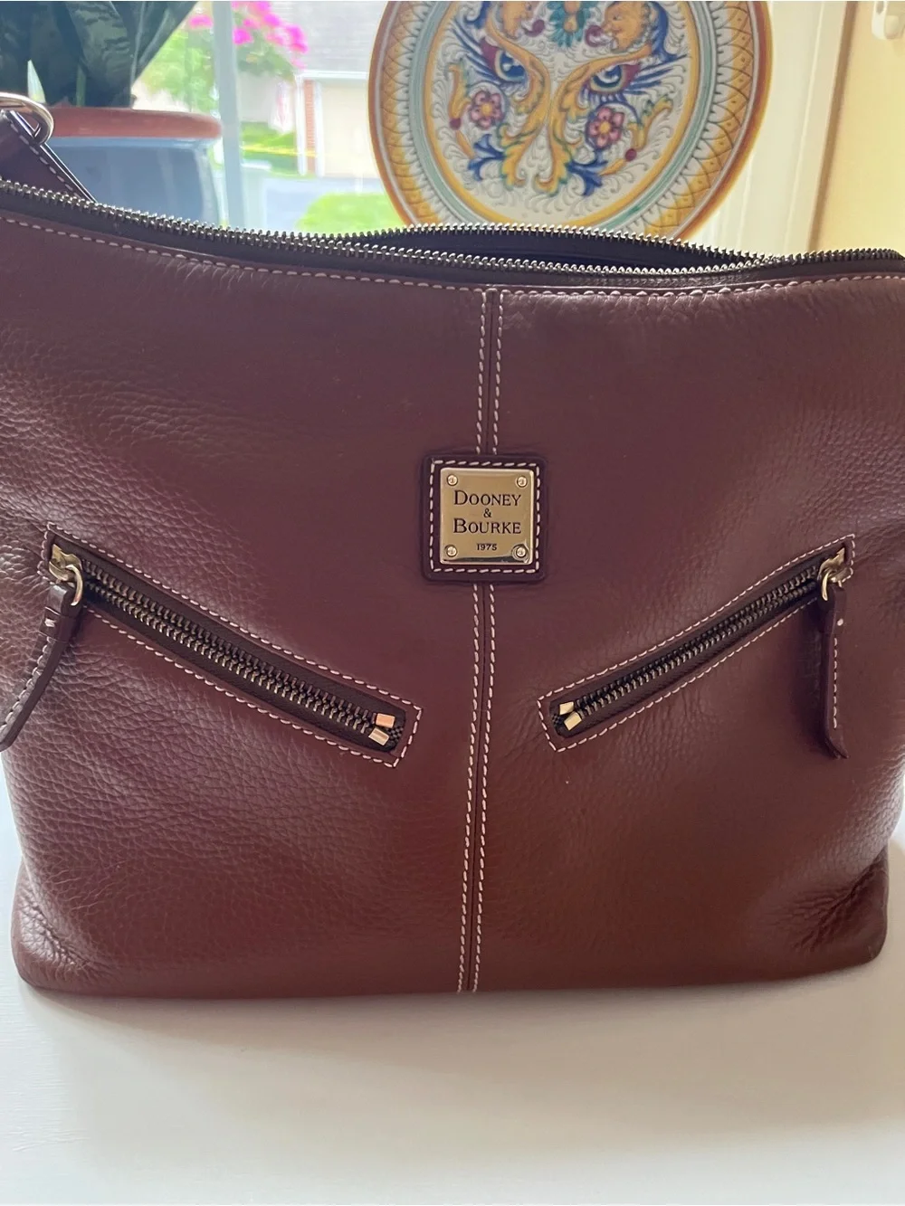 Dooney & Bourke Dark Brown Leather Messenger Bag with Brass Accents